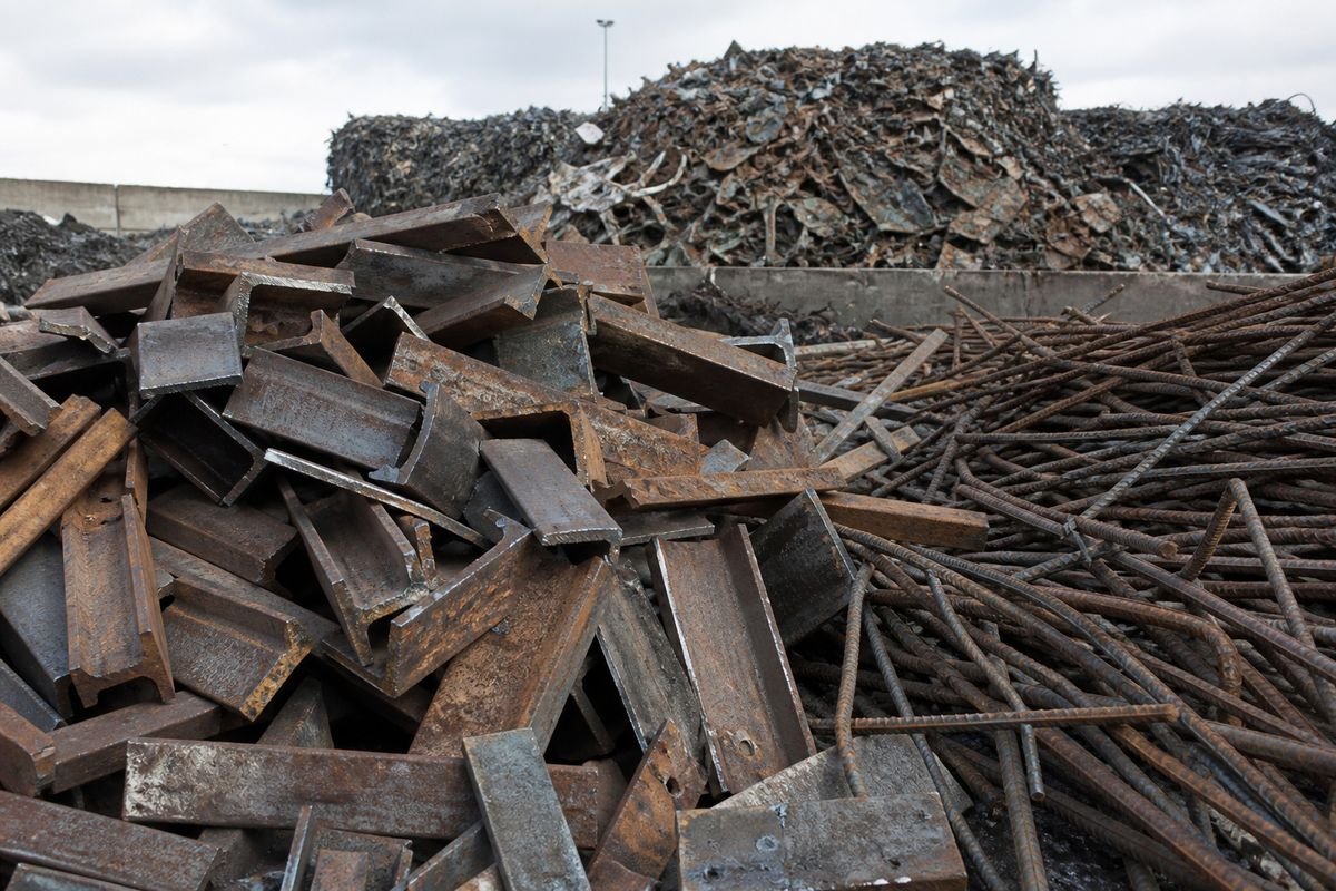 Heavy melting steel, cut beams and rebar in an industrial scrap yard