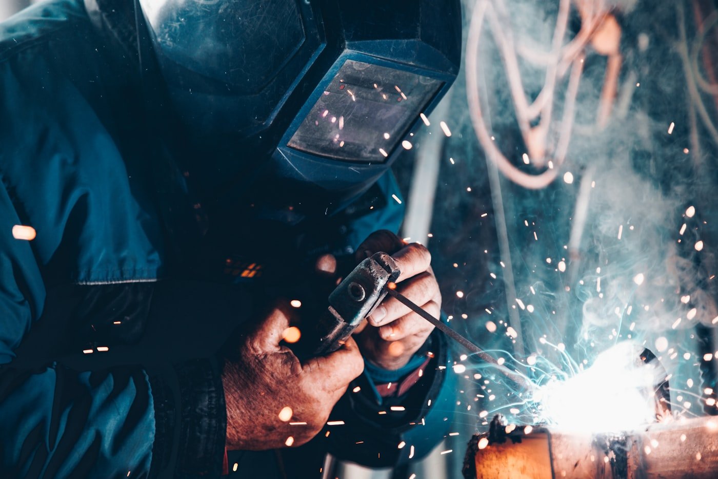 Metal fabrication workshop with steel components ready for grading and trade